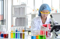 Woman scientist doing experiment. stock images Woman scientist doing experiment. stock images