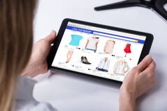 Woman Shopping Online On Digital Tablet royalty free stock image Woman Shopping Online On Digital Tablet royalty free stock image
