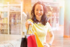 Woman showing her shopping bags royalty free stock photography Woman showing her shopping bags royalty free stock photography