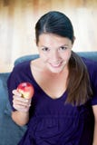 Woman showing a juicy red apple royalty free stock photo Woman showing a juicy red apple royalty free stock photo