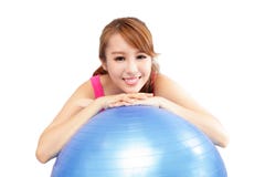Woman smiling leaning on pilates ball Stock Photos Woman smiling leaning on pilates ball Stock Photos