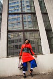 Woman Standing Next to Building Royalty Free Stock Image Woman Standing Next to Building Royalty Free Stock Image
