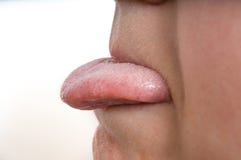 Woman is sticking tongue out. on white background. Stock Photo Woman is sticking tongue out. on white background. Stock Photo