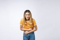 Woman with stomach ache, menstrual period cramp, abdominal pain, food poisoning. royalty free stock photos Woman with stomach ache, menstrual period cramp, abdominal pain, food poisoning. royalty free stock photos