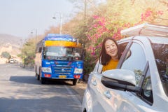 Woman on summer roadtrip leaning out car window travel vacation concept. stock photography Woman on summer roadtrip leaning out car window travel vacation concept. stock photography