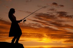 Woman sunset fishing royalty free stock photo Woman sunset fishing royalty free stock photo