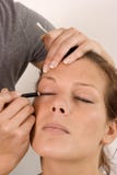 Woman Treated By A Beautician Stock Images