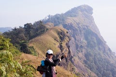 Woman trekker Peak mountain trekking route royalty free stock photo Woman trekker Peak mountain trekking route royalty free stock photo