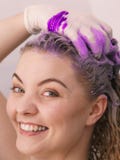 Woman under the shower with colored foam on hair royalty free stock images Woman under the shower with colored foam on hair royalty free stock images