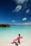 Woman Walk And Relax With Inflatable Mattress In The Sea. Happy Island Lifestyle. White Sand, Crystal-blue Sea Of Tropical Beach. Royalty Free Stock Photo