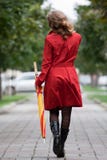 Woman Walking With An Umbrella Royalty Free Stock Photo