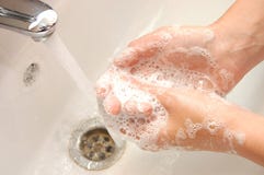 Woman washing hand under running royalty free stock photography Woman washing hand under running royalty free stock photography