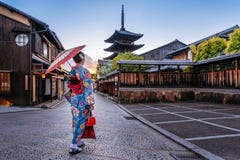 Woman wearing japanese traditional kimono with umbrella at Yasaka Pagoda and Sannen Zaka Street in Kyoto, Japan stock image Woman wearing japanese traditional kimono with umbrella at Yasaka Pagoda and Sannen Zaka Street in Kyoto, Japan stock image