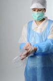 Woman Wearing Plastic Gloves Royalty Free Stock Photos