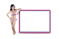Woman wearing striped bikini with copyspace 1 Stock Images Woman wearing striped bikini with copyspace 1 Stock Images