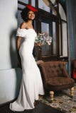 Woman in White Off-shoulder Gown Holding Bouquet of White Flowers Stock Photography Woman in White Off-shoulder Gown Holding Bouquet of White Flowers Stock Photography