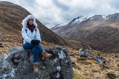 Woman on a rock royalty free stock photography Woman on a rock royalty free stock photography