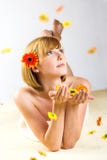 Woman With Falling Flowers Royalty Free Stock Image