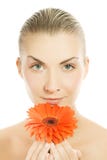 Woman With Gerber Flower Stock Image