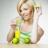 Woman With Juice Stock Photography