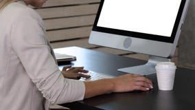 Woman working at home office hand on keyboard close up. White Display. royalty free stock photo Woman working at home office hand on keyboard close up. White Display. royalty free stock photo