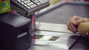 Woman Working On Cash Register In The Store Stock Photography