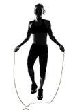 Woman workout fitness posture jumping rope