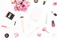 Woman workspace with pink roses bouquet, cosmetics, diary on white background. Top view. Flat lay home feminine desk. Beauty or fa. Woman workspace with pink Royalty Free Stock Photography Woman workspace with pink roses bouquet, cosmetics, diary on white background. Top view. Flat lay home feminine desk. Beauty or fa. Woman workspace with pink Royalty Free Stock Photography