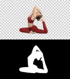 Η όμορφη νέα womandoing γιόγκα ή pilates η άσκηση ένα με πόδια περιστέρι βασιλιάδων θέτει, Eka Pada Rajakapotasana, άλφα κανάλι στοκ εικόνες Η όμορφη νέα womandoing γιόγκα ή pilates η άσκηση ένα με πόδια περιστέρι βασιλιάδων θέτει, Eka Pada Rajakapotasana, άλφα κανάλι στοκ εικόνες