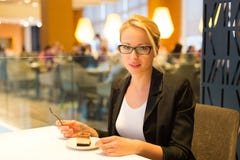 Women eating dessert in fancy restaurant. royalty free stock image Women eating dessert in fancy restaurant. royalty free stock image