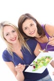 Women Enjoying A Healthy Salad Royalty Free Stock Photos