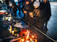 Women Mourning in Strasbourg people paying tribute to victims of stock photography Women Mourning in Strasbourg people paying tribute to victims of stock photography