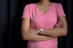 women in pink for breast cancer focus on crossed arms Royalty Free Stock Photo women in pink for breast cancer focus on crossed arms Royalty Free Stock Photo