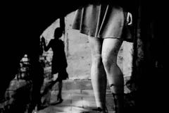 Silhouette of a woman in a dark alley of the city stock photography Silhouette of a woman in a dark alley of the city stock photography