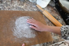 Women`s hands preparing flour in preparation process for baking. Girl preparing to bake royalty free stock photos Women`s hands preparing flour in preparation process for baking. Girl preparing to bake royalty free stock photos