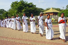Women visit the Jaya Sri Maha Bodhi in Anuradhapura