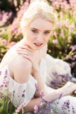 Wonderful portrait of girl in light dress in lavender field on sunset royalty free stock images Wonderful portrait of girl in light dress in lavender field on sunset royalty free stock images
