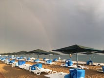 Wonderful rainbow over the sea and the beach in Turkey after heavy rain stock photography Wonderful rainbow over the sea and the beach in Turkey after heavy rain stock photography