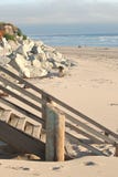 Wood Stairs And Rocks On Beach In California Royalty Free Stock Photography