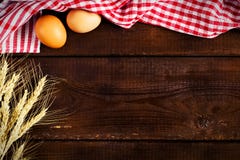 Wooden background, kitchen towel and cooking ingredients stock images Wooden background, kitchen towel and cooking ingredients stock images