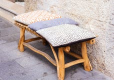 .wooden bench with soft pillows on the street of Catania, Sicily, Italy royalty free stock photos .wooden bench with soft pillows on the street of Catania, Sicily, Italy royalty free stock photos