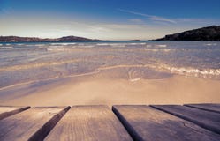 Wooden Board With Beautiful Beach As Background, Ruby Retro Filter royalty free stock photos Wooden Board With Beautiful Beach As Background, Ruby Retro Filter royalty free stock photos