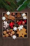 Wooden Box With Christmas Symbols And Spruce Branches, Top View Royalty Free Stock Images