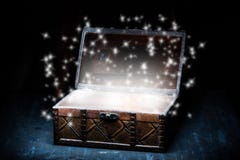 Wooden coffer with white sparkling lights Royalty Free Stock Images Wooden coffer with white sparkling lights Royalty Free Stock Images