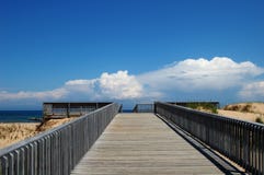 Wooden deck on lake Superior with a blue backgorund a white clouds. stock images Wooden deck on lake Superior with a blue backgorund a white clouds. stock images