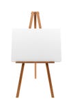 Wooden easel with blank canvas isolated on white