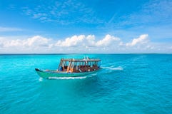 Wooden Maldivian Traditional Dhoni Boat On A Sunny Royalty Free Stock Photography Wooden Maldivian Traditional Dhoni Boat On A Sunny Royalty Free Stock Photography