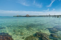 Wooden pier with tropical hut at resort in Phuket, Thailand. Sum Royalty Free Stock Images Wooden pier with tropical hut at resort in Phuket, Thailand. Sum Royalty Free Stock Images