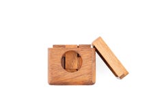 A wooden puzzle is a cube. Isolated on white background. Close-up. stock photos A wooden puzzle is a cube. Isolated on white background. Close-up. stock photos