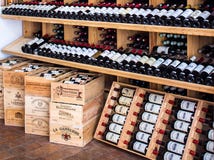 wooden racks with wine stock photo wooden racks with wine stock photo